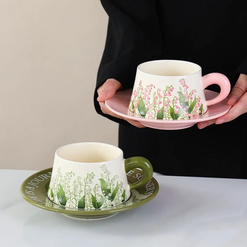 Ceramic coffee cup set with matching saucers and spoons in two design options