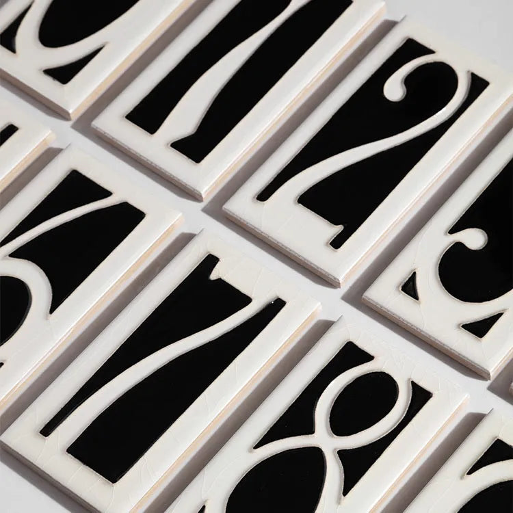 Handmade retro-style ceramic door number plaque with enamel finish, shown with the number 5.
