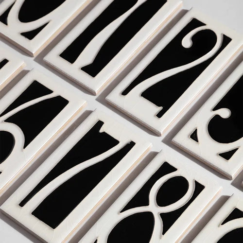 Handmade retro-style ceramic door number plaque with enamel finish, shown with the number 5.
