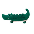 Green plush toy dog with soft fabric and beanbag weight for stability