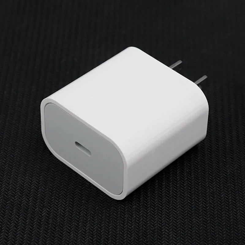 White PD20W mobile phone charger with USB port and choice of European or US plug.