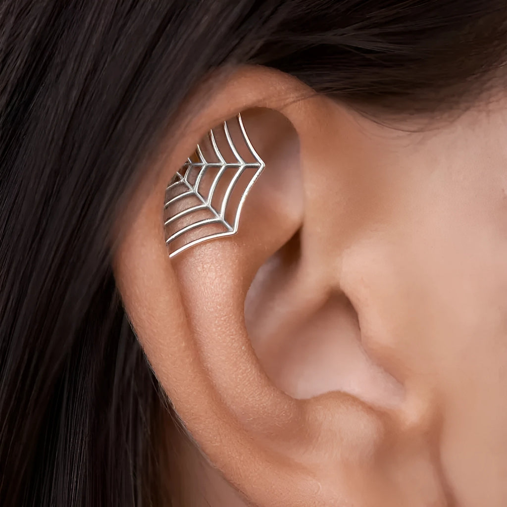 Geometric spider web stud earrings with mesh design in electroplated gold or silver metal finish.