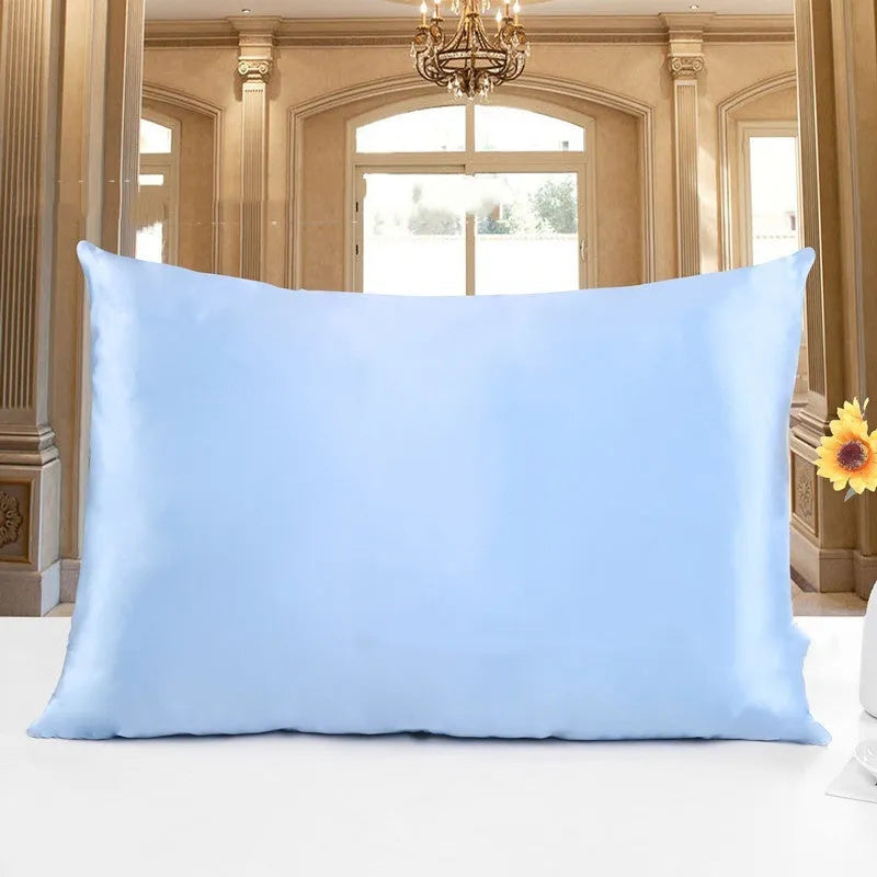 Double-sided silk pillowcase showing reversible design in apricot colour with three size options displayed