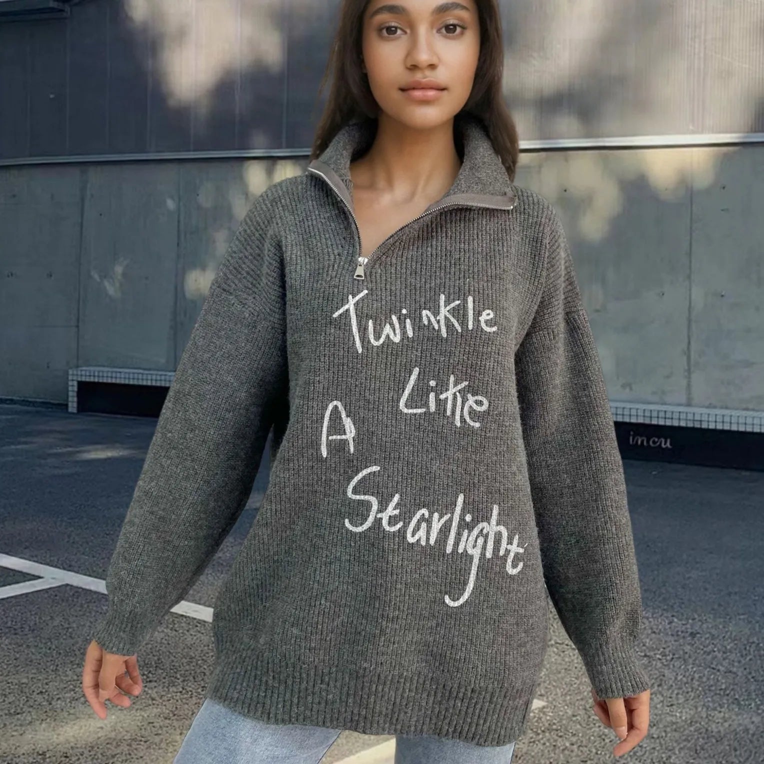 Women's light khaki Alpaca wool pullover sweater with a turtleneck, loose lapels, and a diagonal oblique zipper.