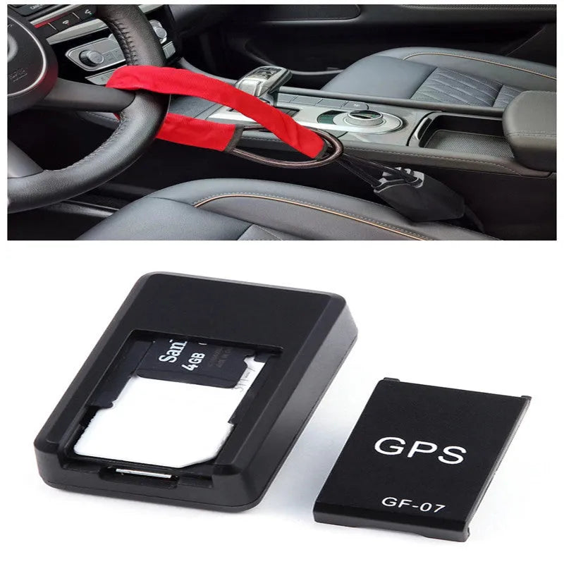 Black plastic magnetic GPS car tracker device measuring 35x20x14mm with USB charging cable