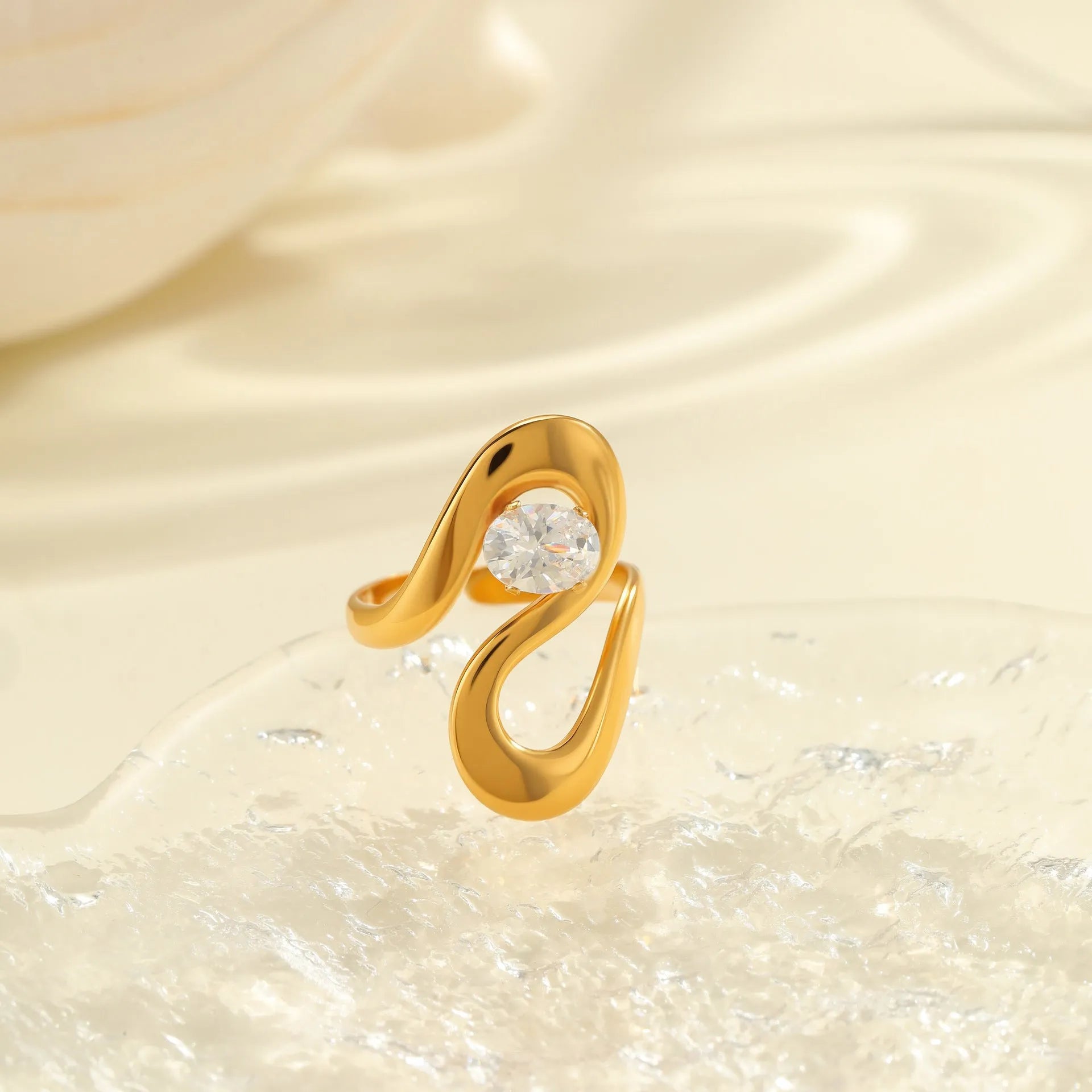 Geometric stainless steel zircon ring with open mouth design showing round, oval and quadrangle elements