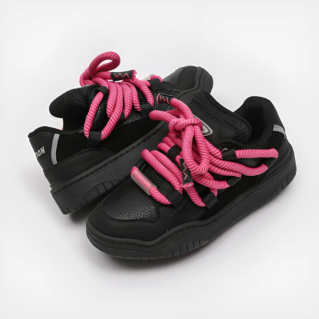 Low-top unisex casual shoes in denim blue with white rubber sole and lace-up front.