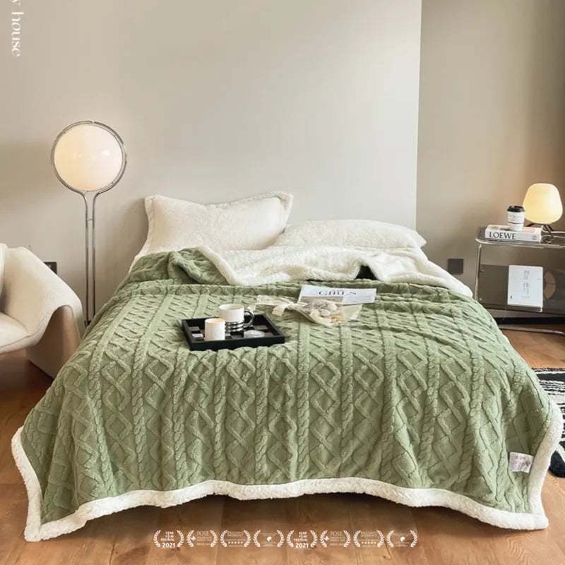 Polyester flannel winter blanket in tea green colour showing taffeta thermal weave texture