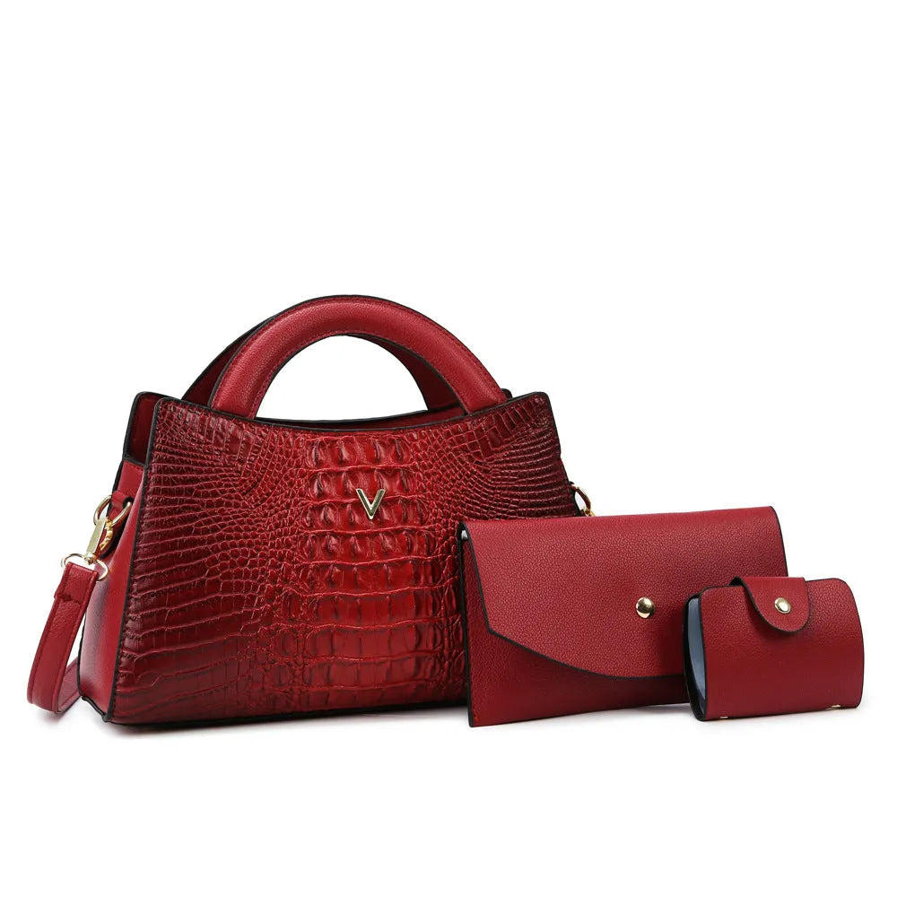 Women's black crocodile pattern PU leather crossbody bag with a single strap and front sandwich pocket.