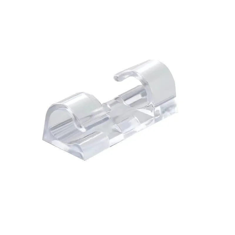 Transparent self-adhesive plastic snap clips for cable management on a white background.