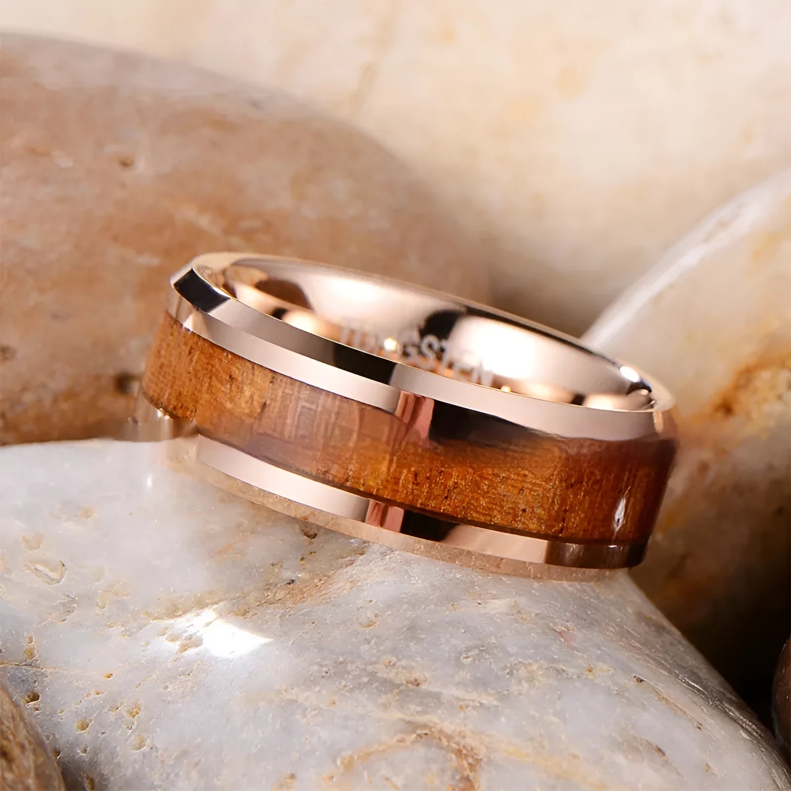 Men's tungsten ring with brown leather inlay and wood detail on an 8mm wide band in rose gold tone.