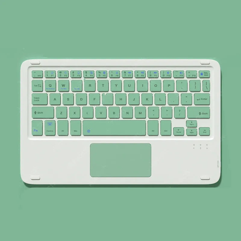 Pink wireless Bluetooth keyboard and mute mouse with USB charging cable on a desk
