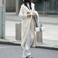 Long grey knitted cardigan with hooded trench coat design and regular long sleeves