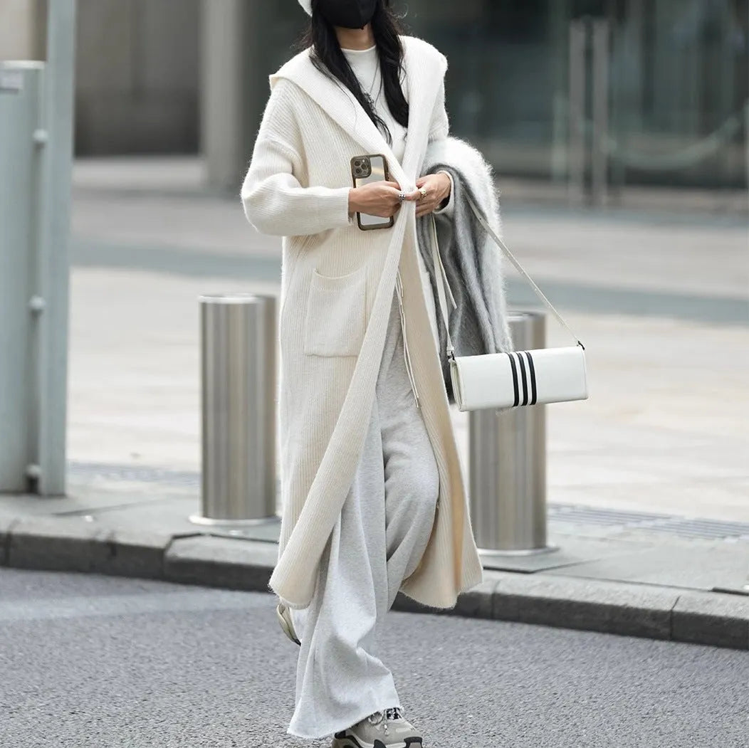 Long grey knitted cardigan with hooded trench coat design and regular long sleeves