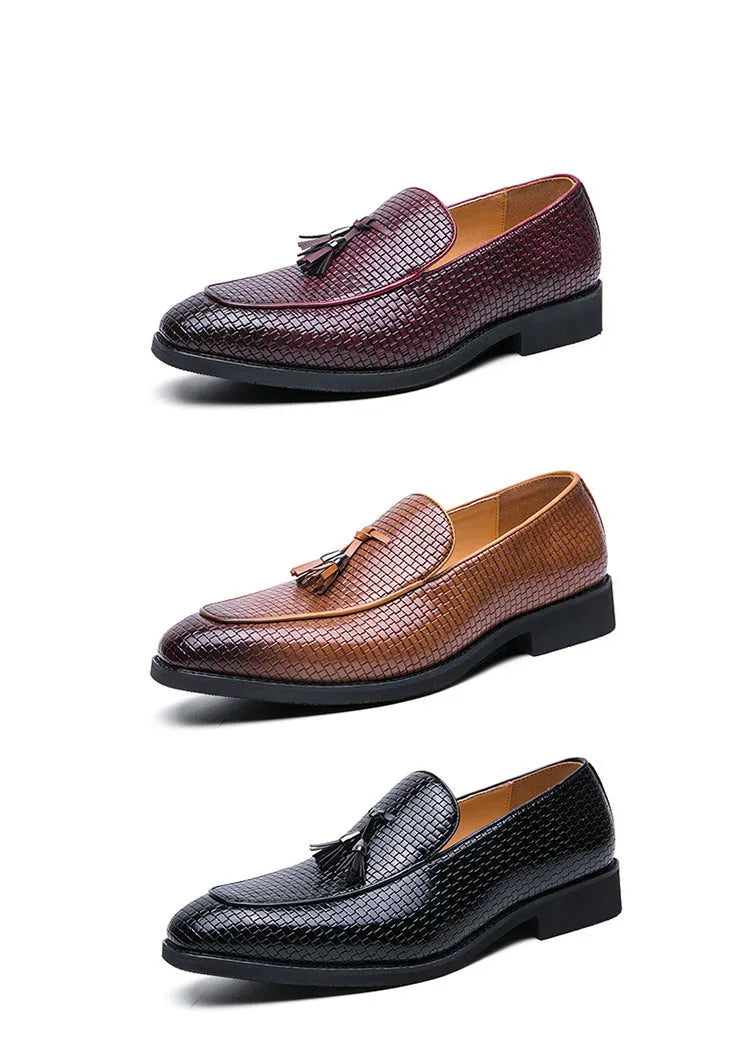 Men's black pointed slip-on business shoes with tassel detail on artificial PU leather upper