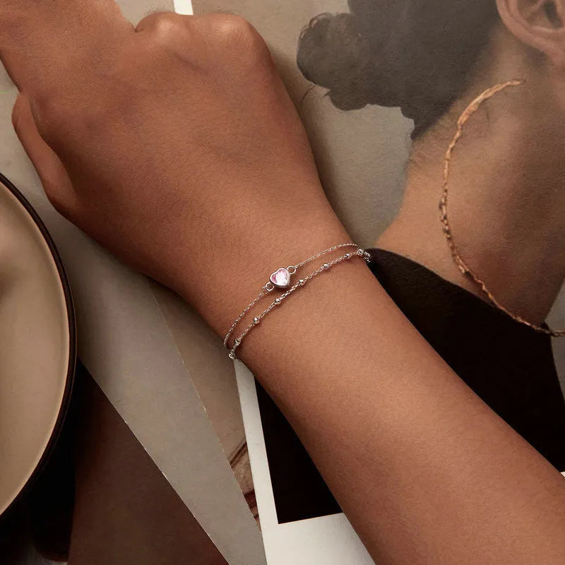 Sweet girlish heart-shaped sterling silver bracelet with a 6mm pendant on an adjustable chain