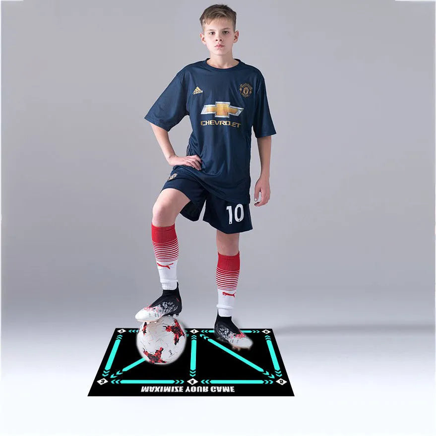 Black football training mat measuring 60 by 90 centimetres with a non-slip rubber base