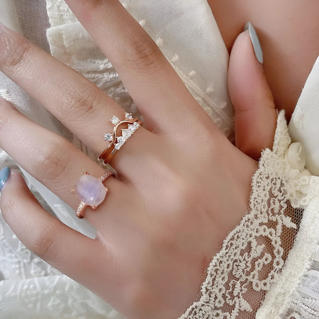 Silver multi-layer moonstone rose gold ring set of 3 on display, unisex geometric style