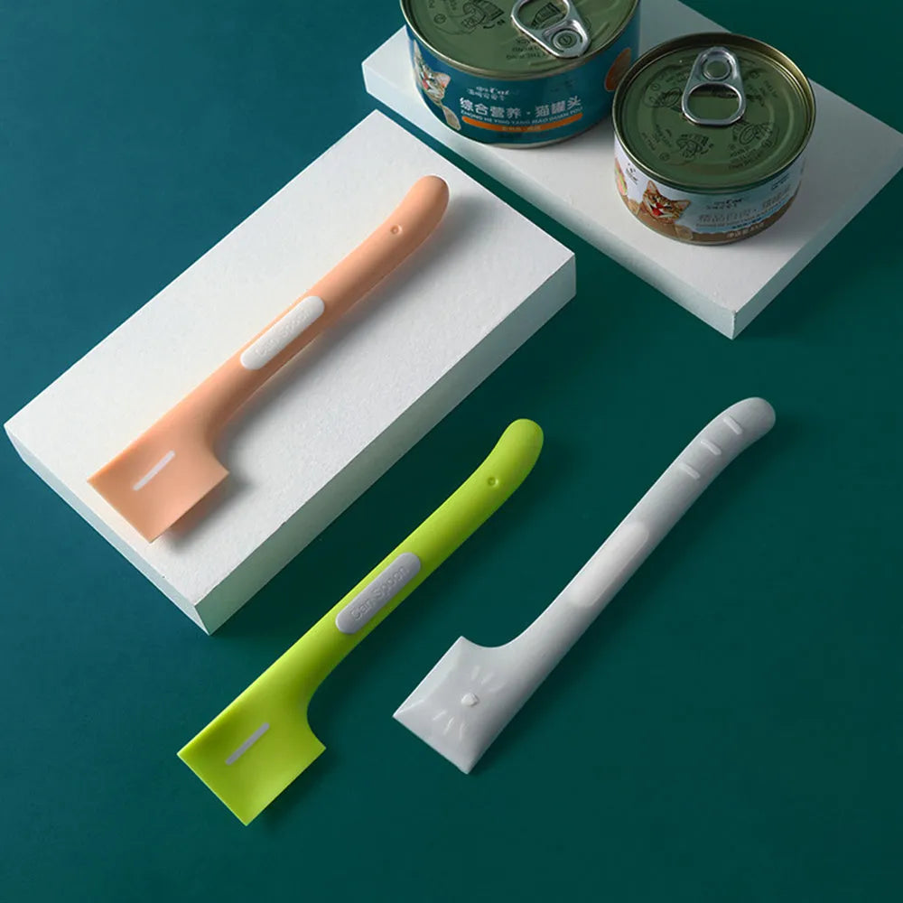 Long-handled pet feeding spoon in green colour with right-angle design for canned food