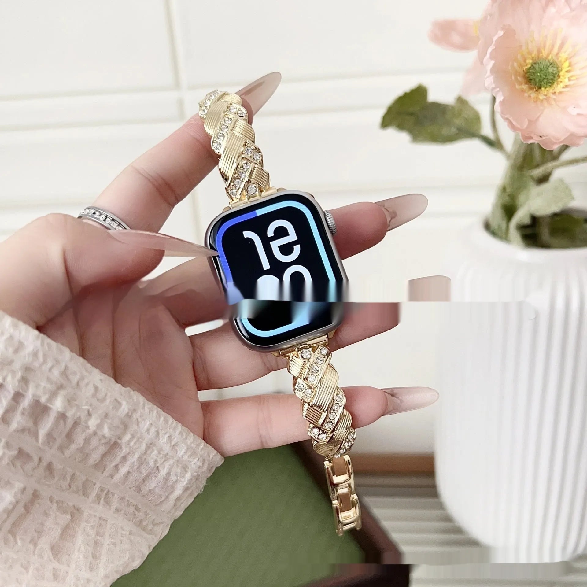 Zinc alloy Apple Watch strap with diamond twist design in silver, rose gold, gold, black, and Starlight colours.