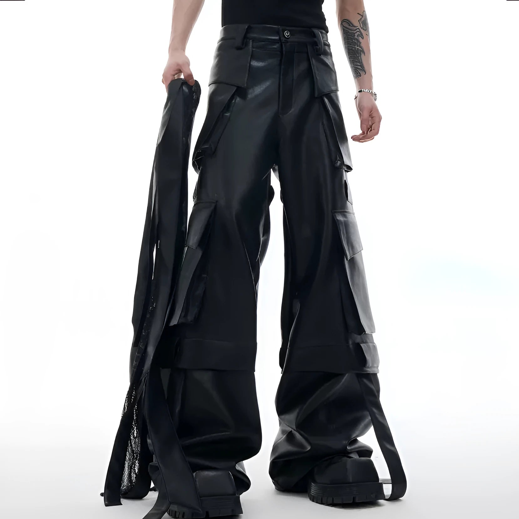 Men's black loose-fit quilted trousers with multiple pockets and heavy stitching