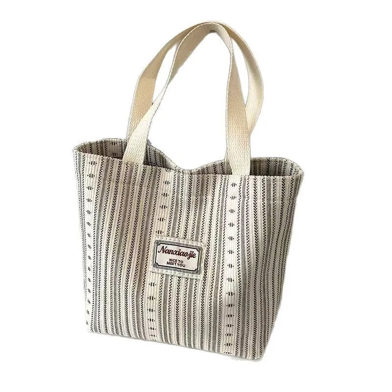 Japanese style large corduroy shoulder bag in dark brown colour showing textured fabric and casual design.