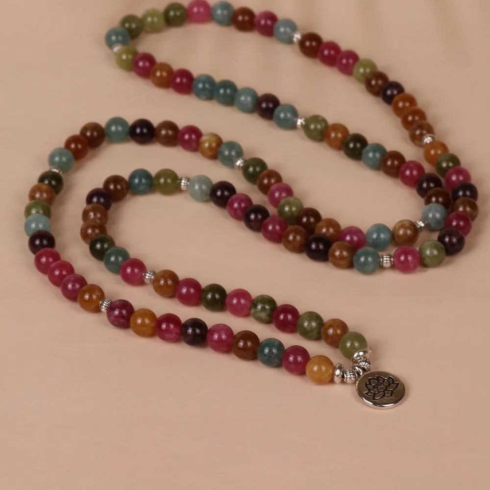 Multi-layer 108 bead bracelet with hanging lotus pendant in tourmaline colour