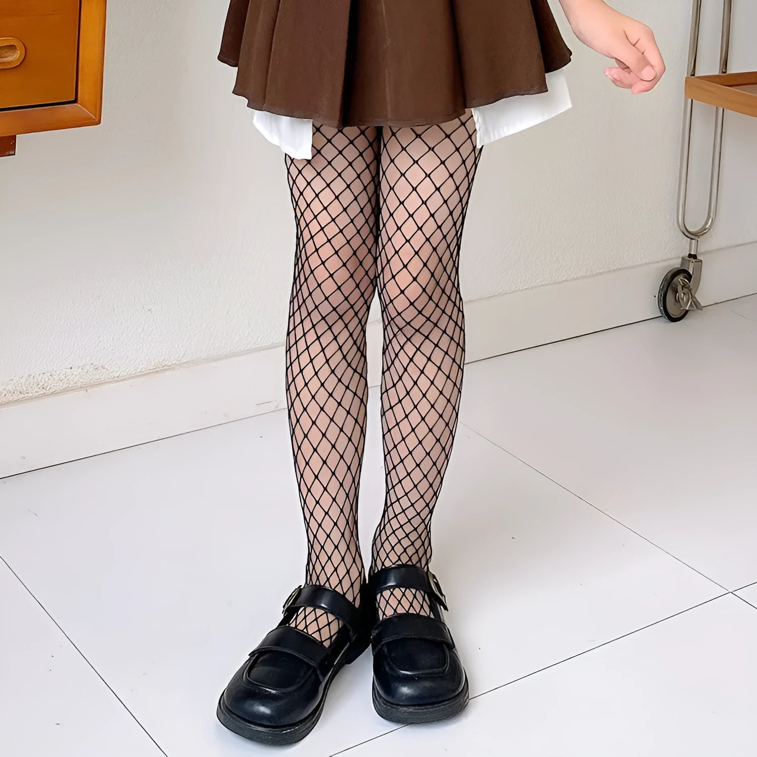 Women's black and white mesh pattern tights showing large, medium, and small net designs for summer.
