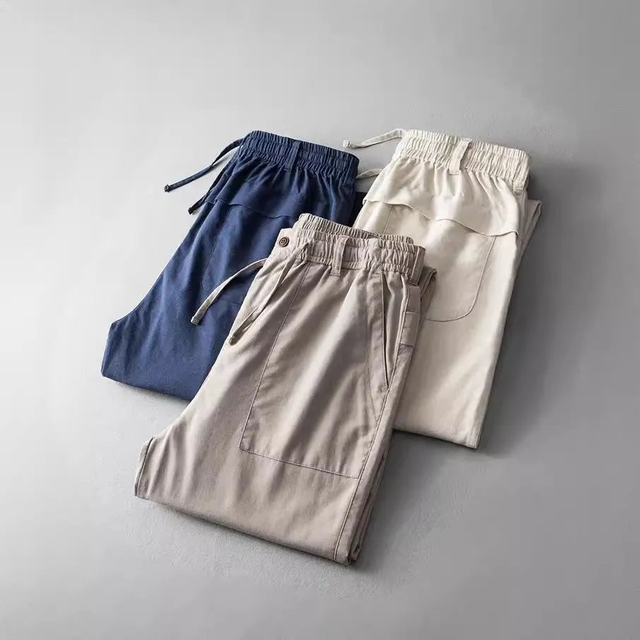 Men's linen trousers in solid colour with mid waist design for casual leisure wear