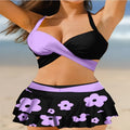 Women's purple bikini swimsuit with matching skirt showing high-waisted lace-up back design