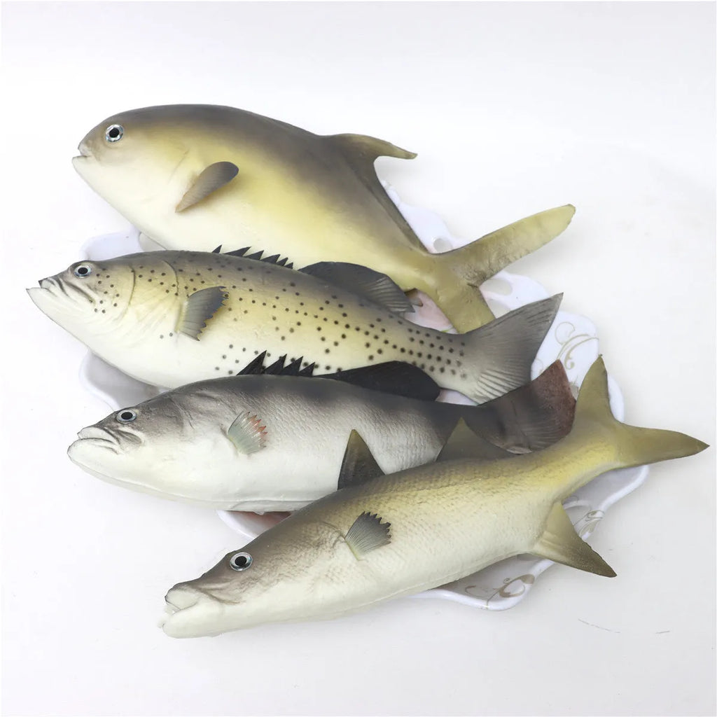 Three PU simulated fish ornaments including yellow-fin tuna and small tuna marine models
