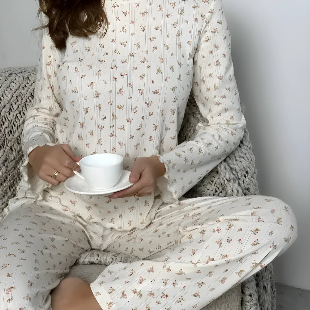 Women's white floral print lounge suit with bell sleeve top and wide leg trousers