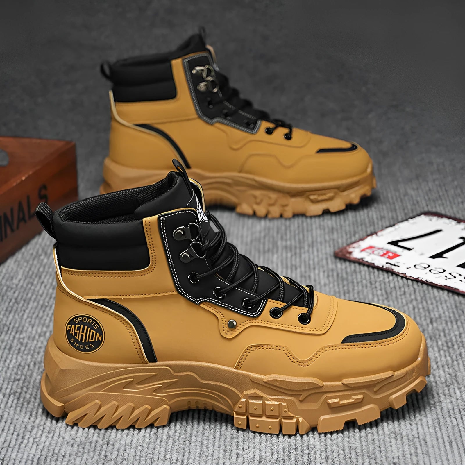 Men's black and yellow artificial PU Martin boots with a mid-height heel and injection moulded sole.