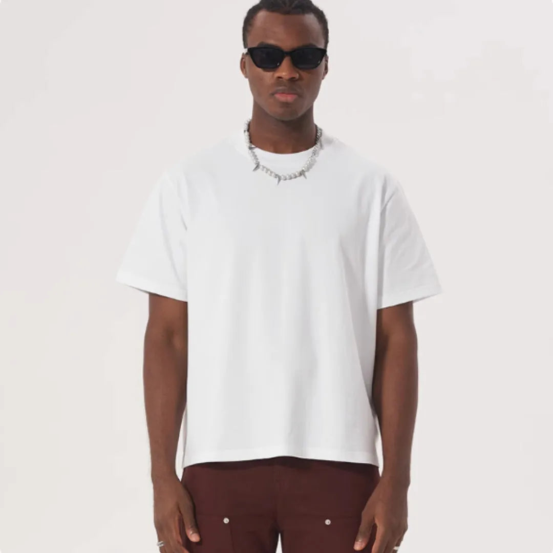 Men's loose fit pure cotton American style T-shirt in apricot colour on a hanger