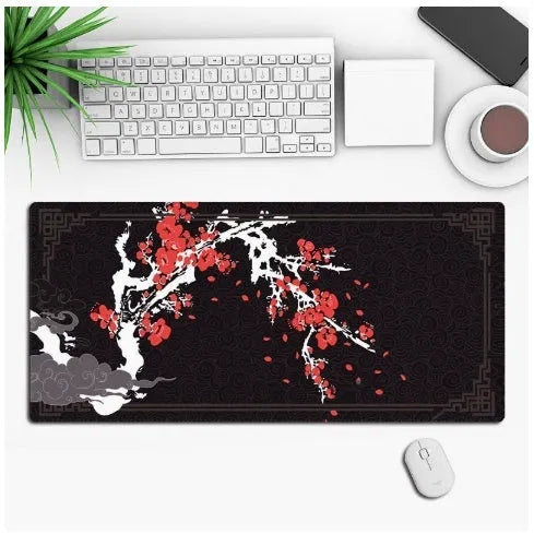 Hot anime series gaming mouse pad with colourful graphic, shown on a desk with a mouse.