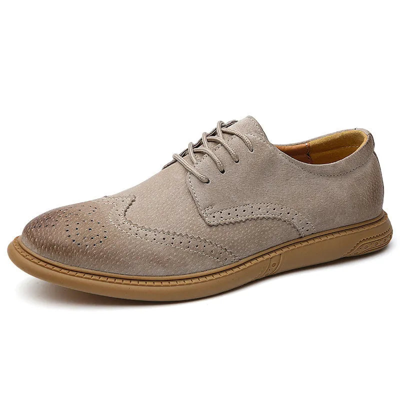 Men's grey low-top leather business shoes with lace-up design and non-slip rubber sole.