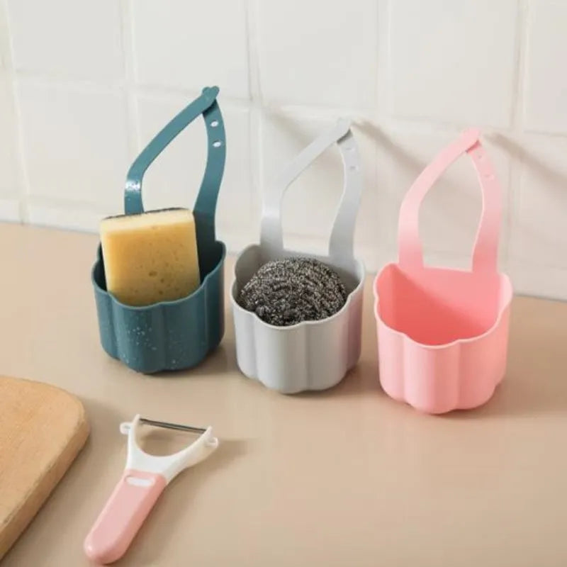 Plastic sink drain basket in Nordic style, shown in dark blue, measuring 20 cm long by 10 cm wide.