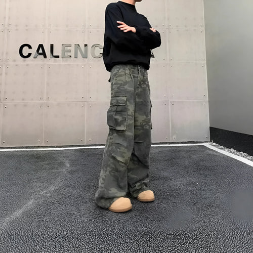 American vintage style washed camouflage cargo pants with multiple pockets on a mid-waist, full-length silhouette.