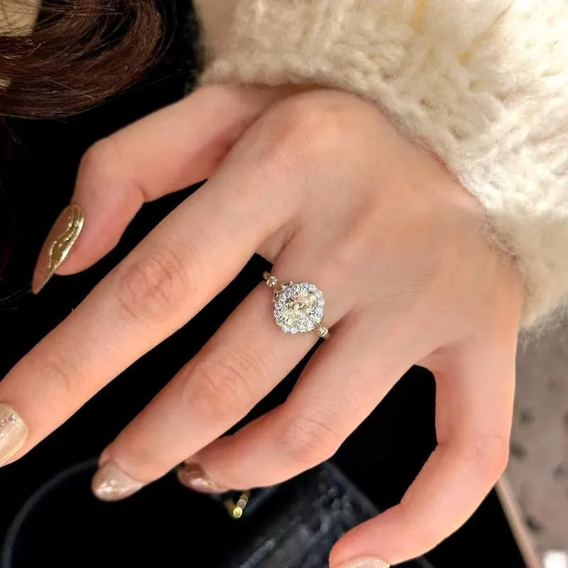 Silver geometric ellipse ring with diamond treatment and adjustable opening
