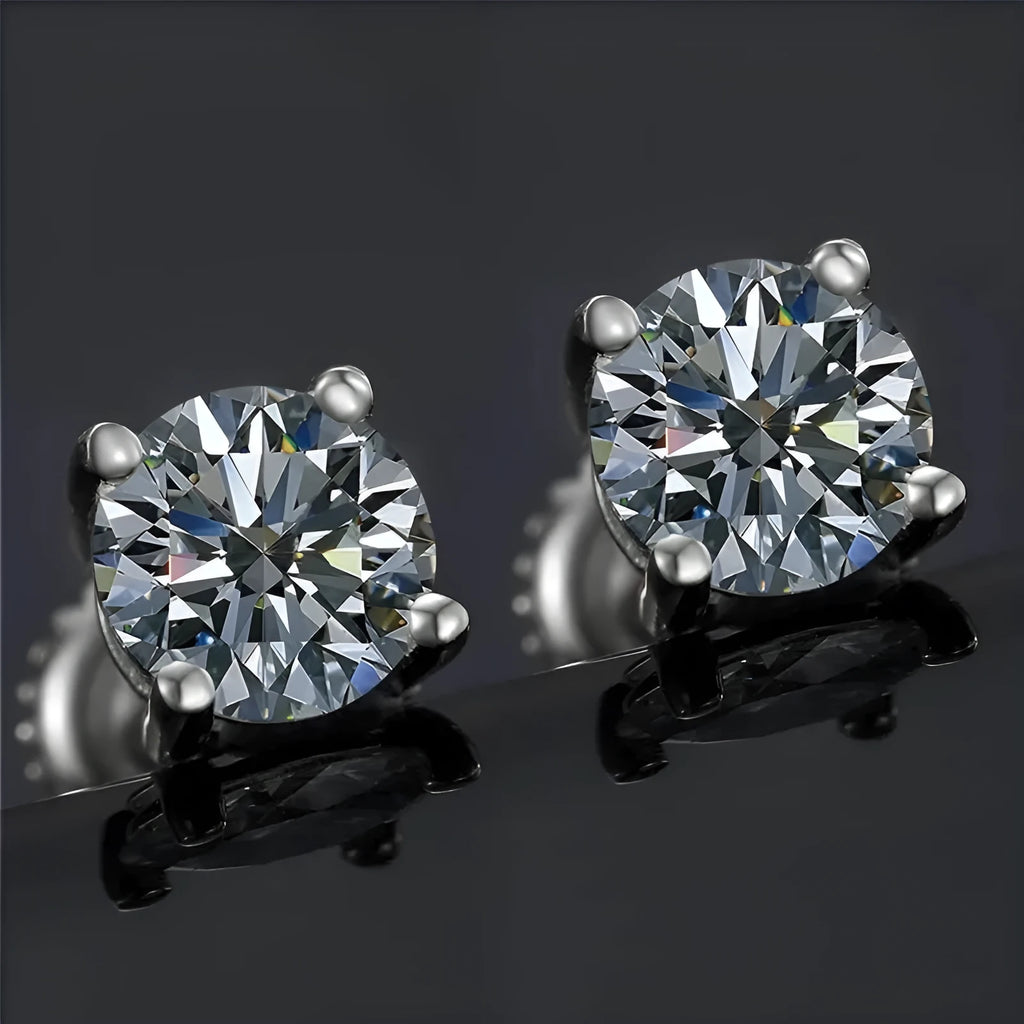 Silver claw set moissanite stud earrings with screw back, showing geometric stone.
