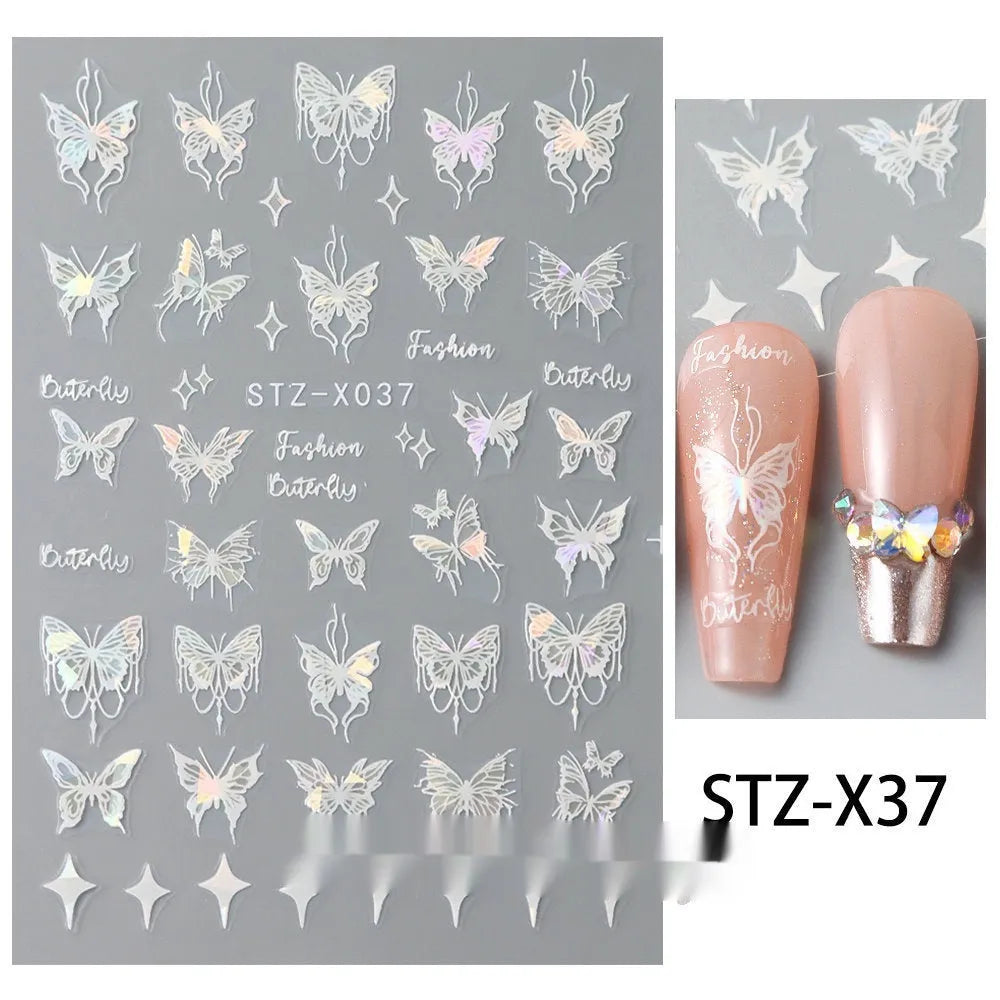 Sheet of black and silver love heart pattern nail art stickers with a plastic nail patch.