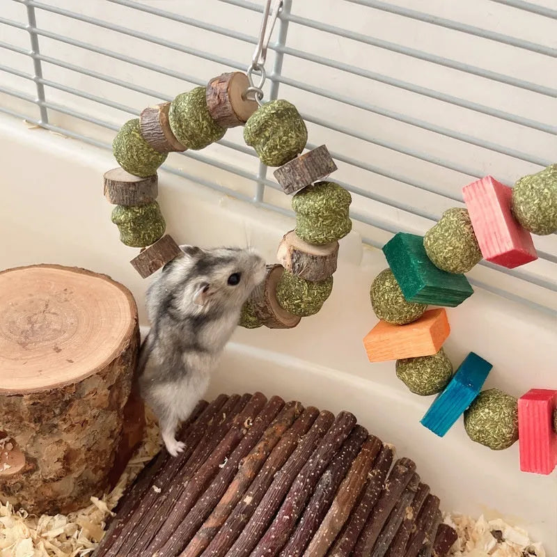 Hamster chew toy with decorative straw ball ring for guinea pigs and rabbits