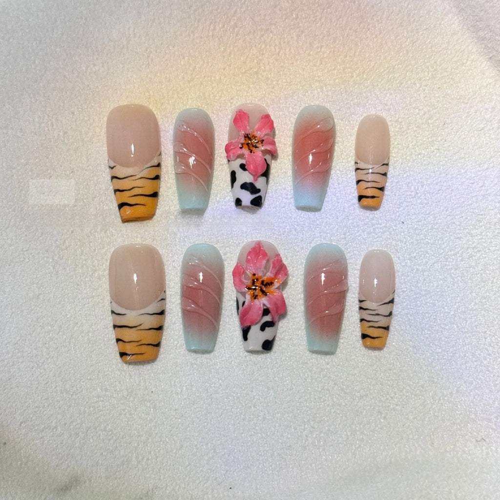 Zebra pattern lily hand carving nail art set showing flower, leopard print, and embossed designs in various sizes.