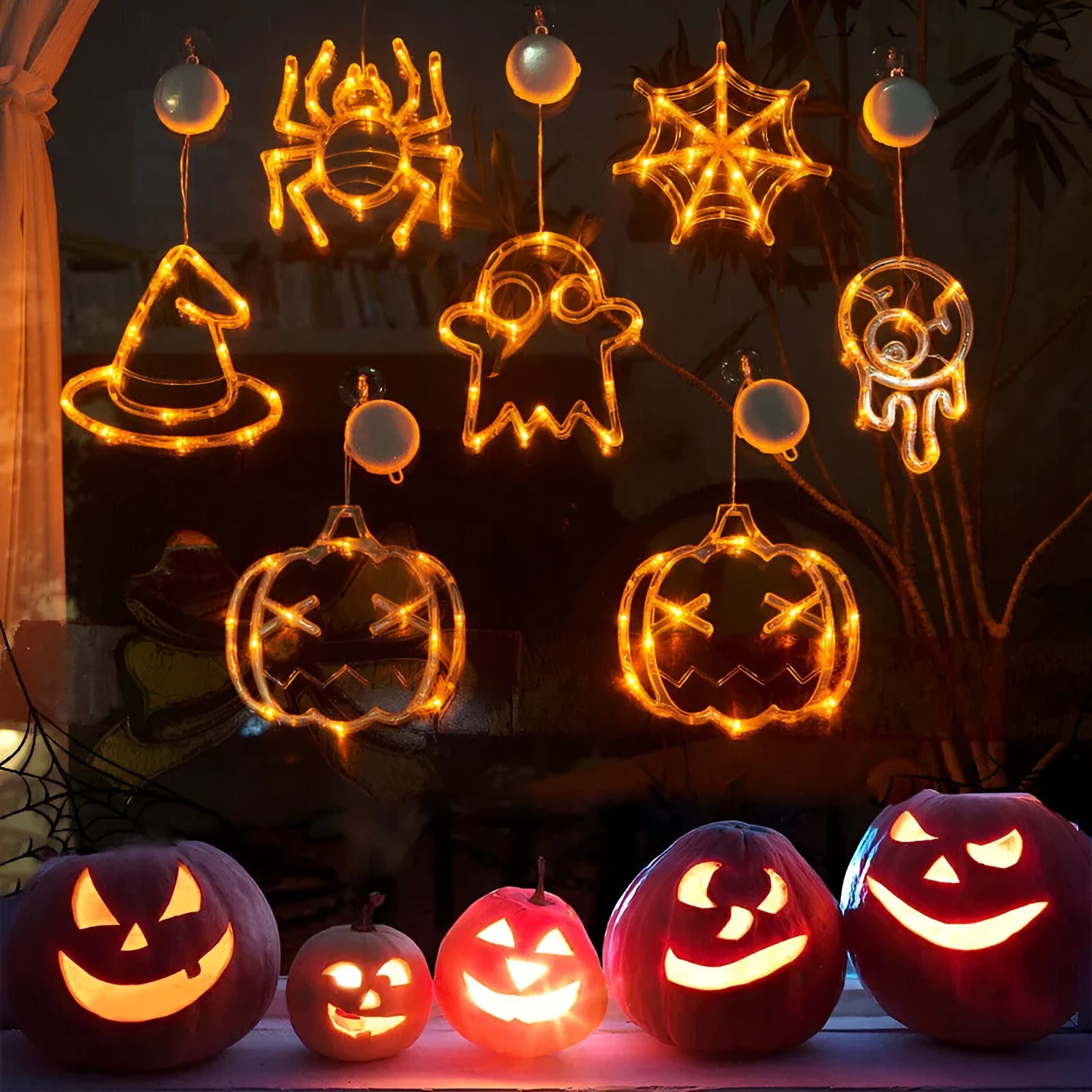 Halloween window hanging LED lights with suction cups showing multiple horror-themed designs powered by batteries