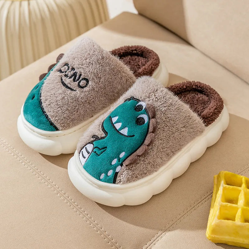 A pair of plush cotton couple slippers with dinosaur designs in coffee, grey, or orange-yellow, shown with a thickened sole.