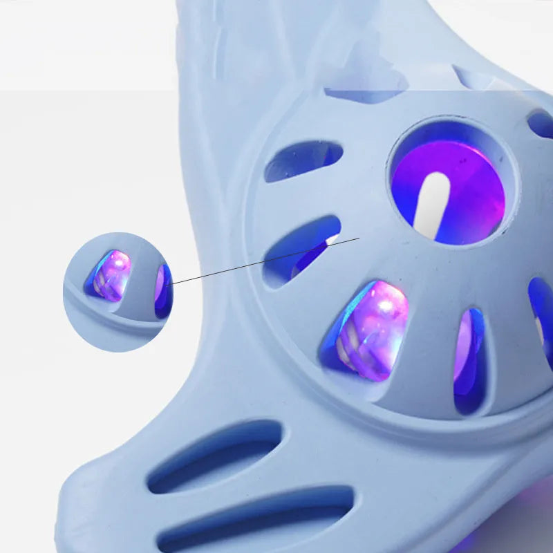 Blue or purple bite-resistant boomerang dog chew toy with molar edge texture for puppy teeth relief