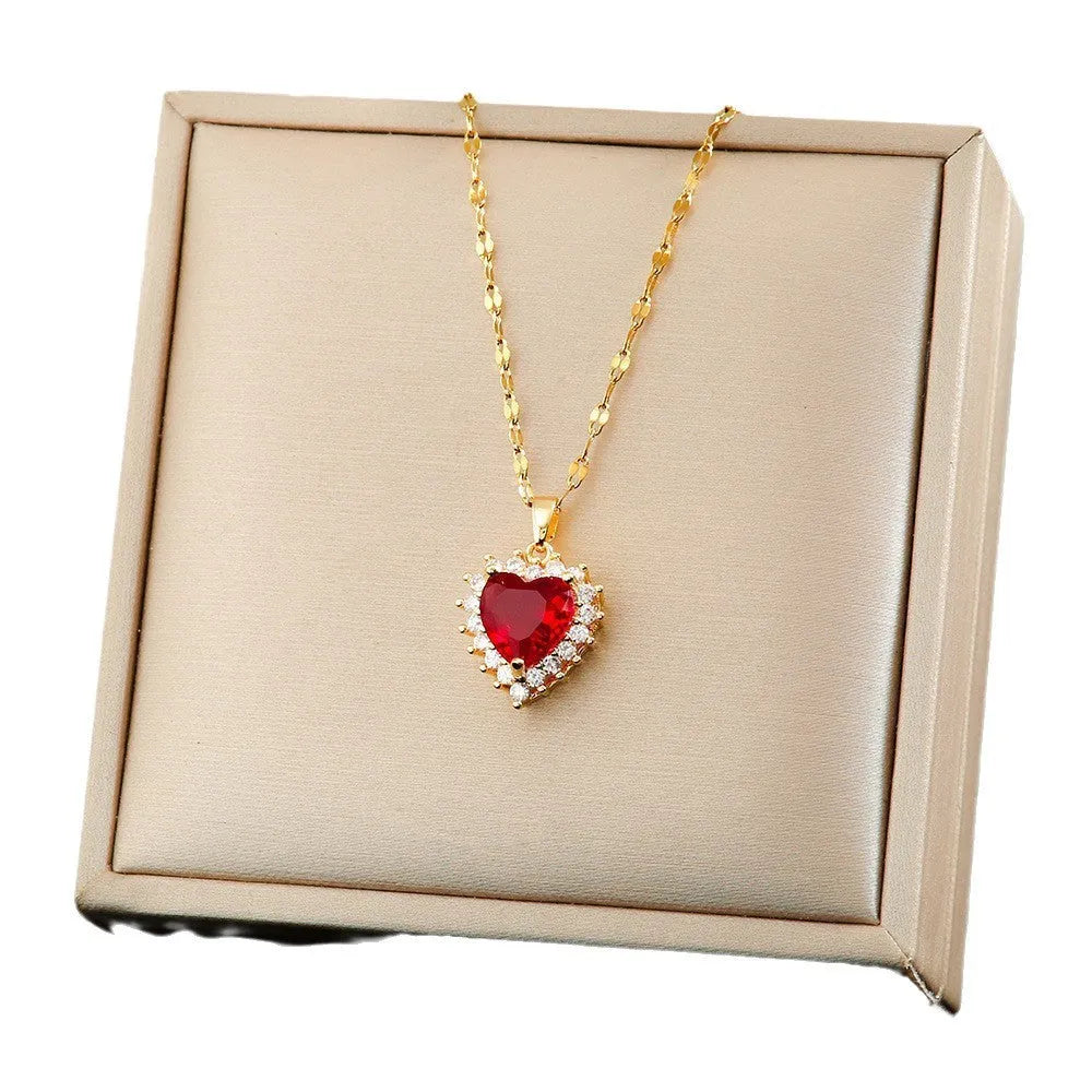 Women's titanium steel jewellery set with heart-themed mixed gem pendants in gold red colour