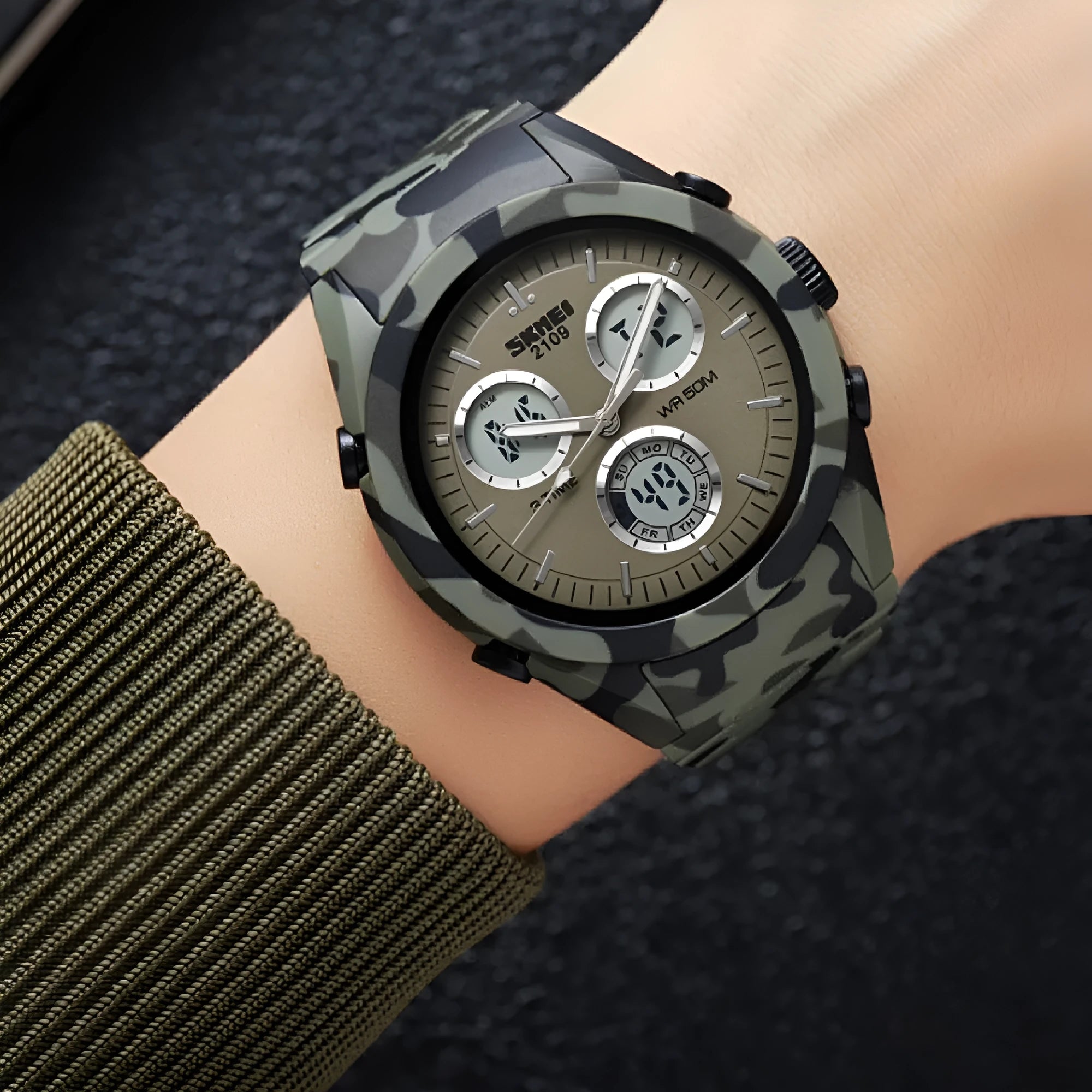 Electronic casual watch with camouflage pattern, resin mirror, and TPU strap showing 50m waterproof rating