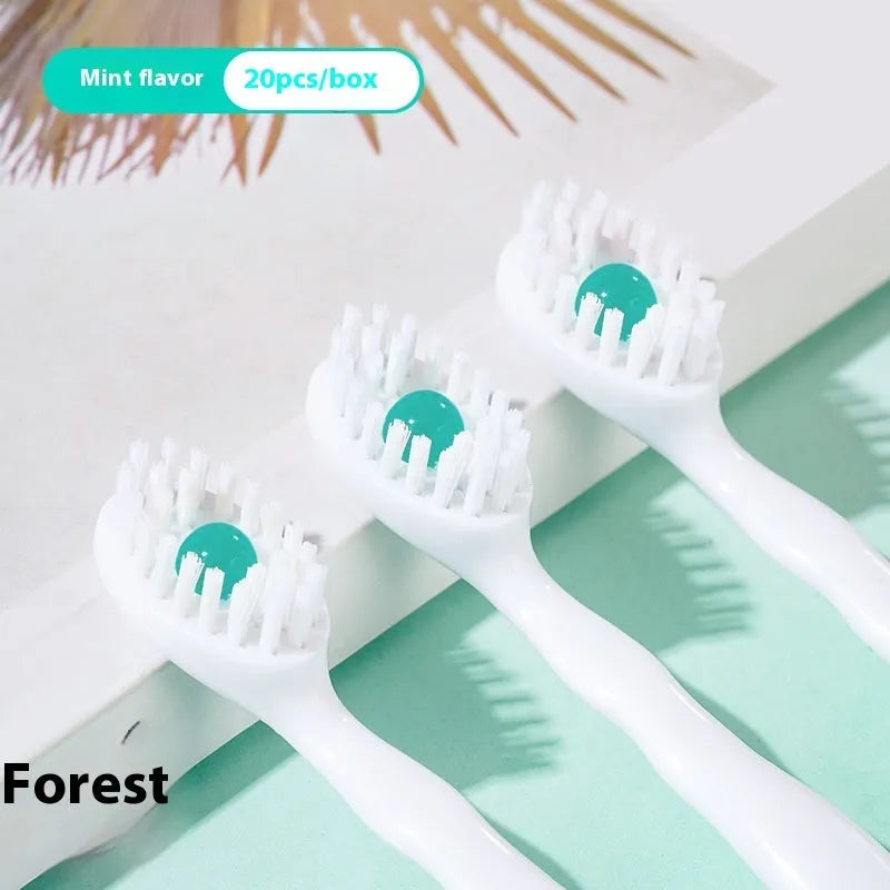 Box of 20 disposable bead travel toothbrushes in mint, peach, plum green tea and mixed flavours.