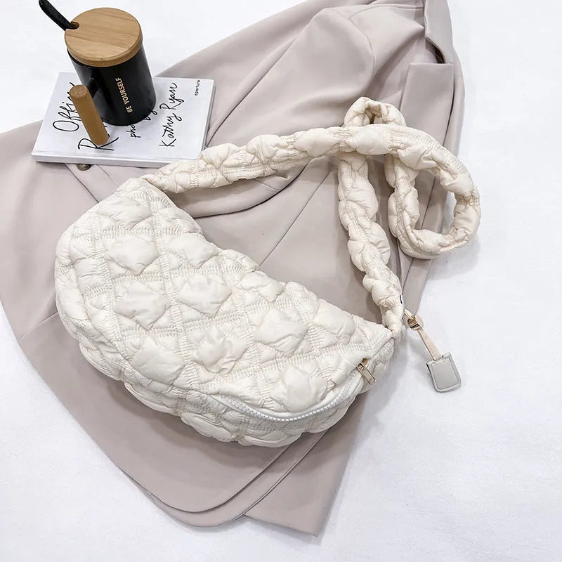 Women's nylon shoulder messenger bag in beige colour showing adjustable strap and dimensions